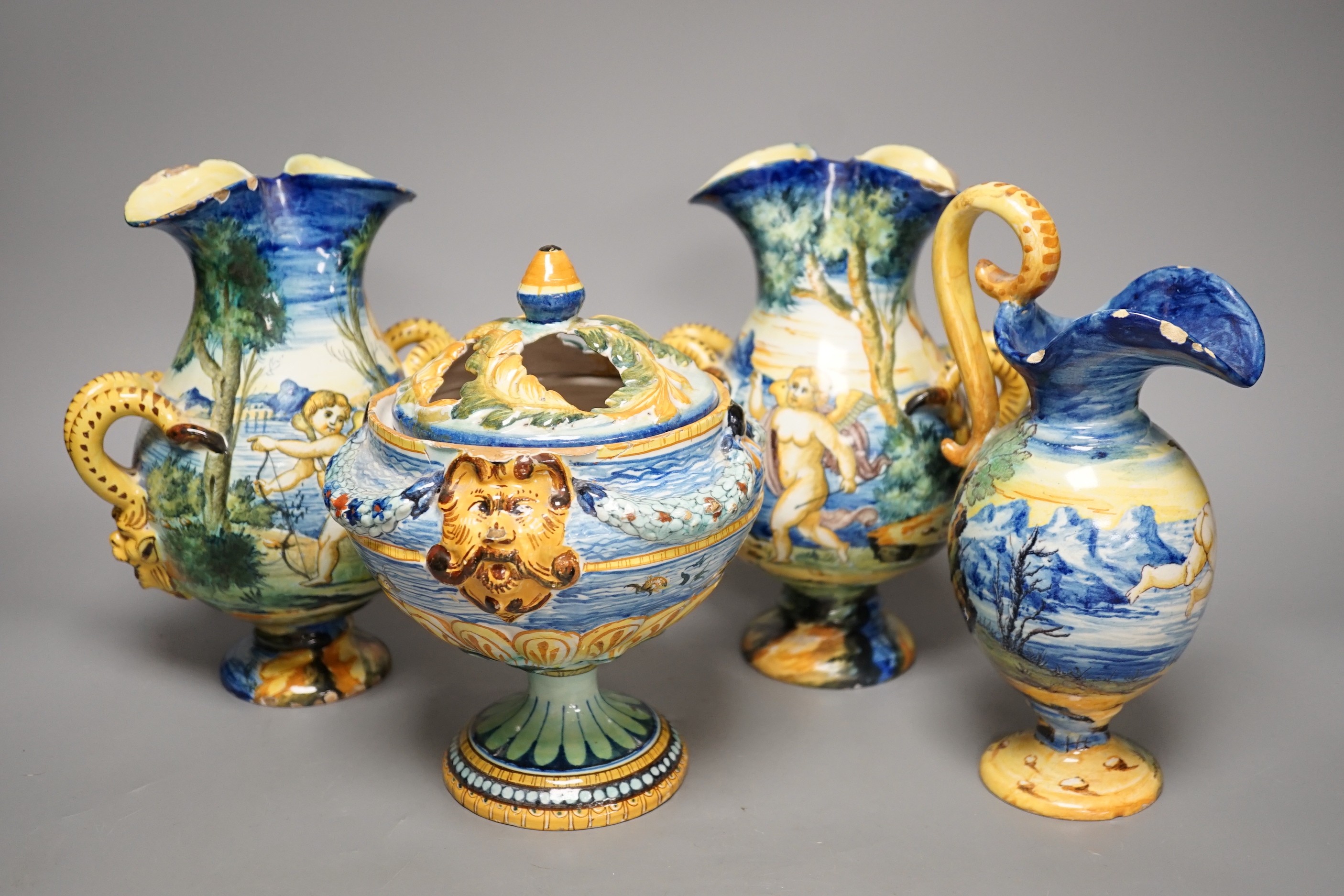 A pair of Cantagalli maiolica vases, a Cantagalli maiolica ewer and a similar potpourri. Tallest 21cm